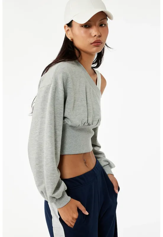 Bluza crop de trening cu decolteu pe un umar - Gri deschis
