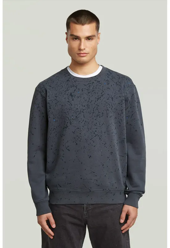 Bluza de trening din bumbac organic cu model cu pete de vopsea - Albastru inchis