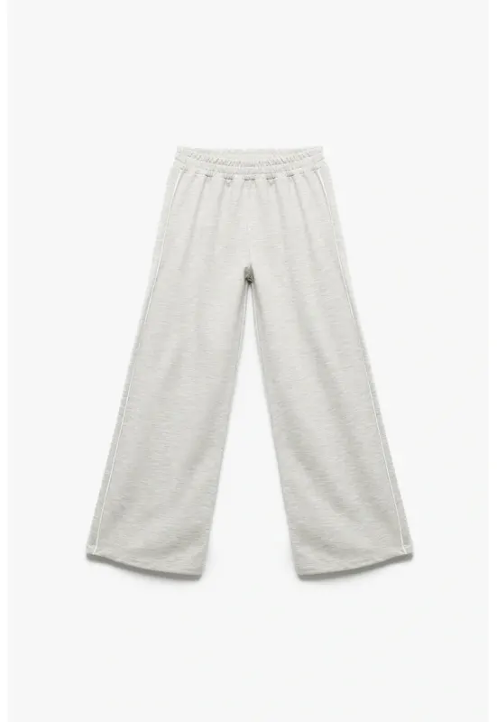 Pantaloni de trening cu croiala ampla si talie elastica - Gri deschis melange