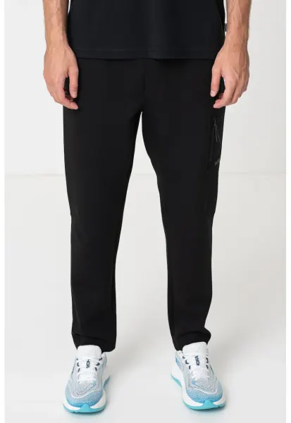 Pantaloni de trening din amestec de modal cu croiala conica Urban Tech - Negru