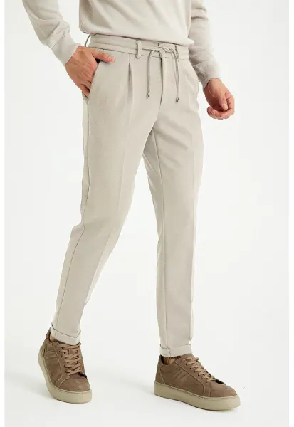 Pantaloni jogger cu croiala conica - Bej