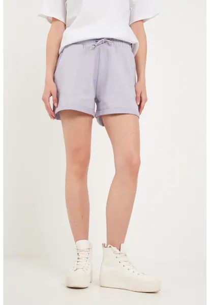 Pantaloni scurti de trening cu buzunare oblice - Lila pal